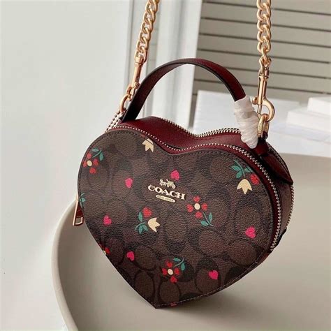 bolsa coach de corazon.